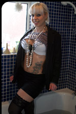 loz stands wet, in the shower, fully clothed wetlook
